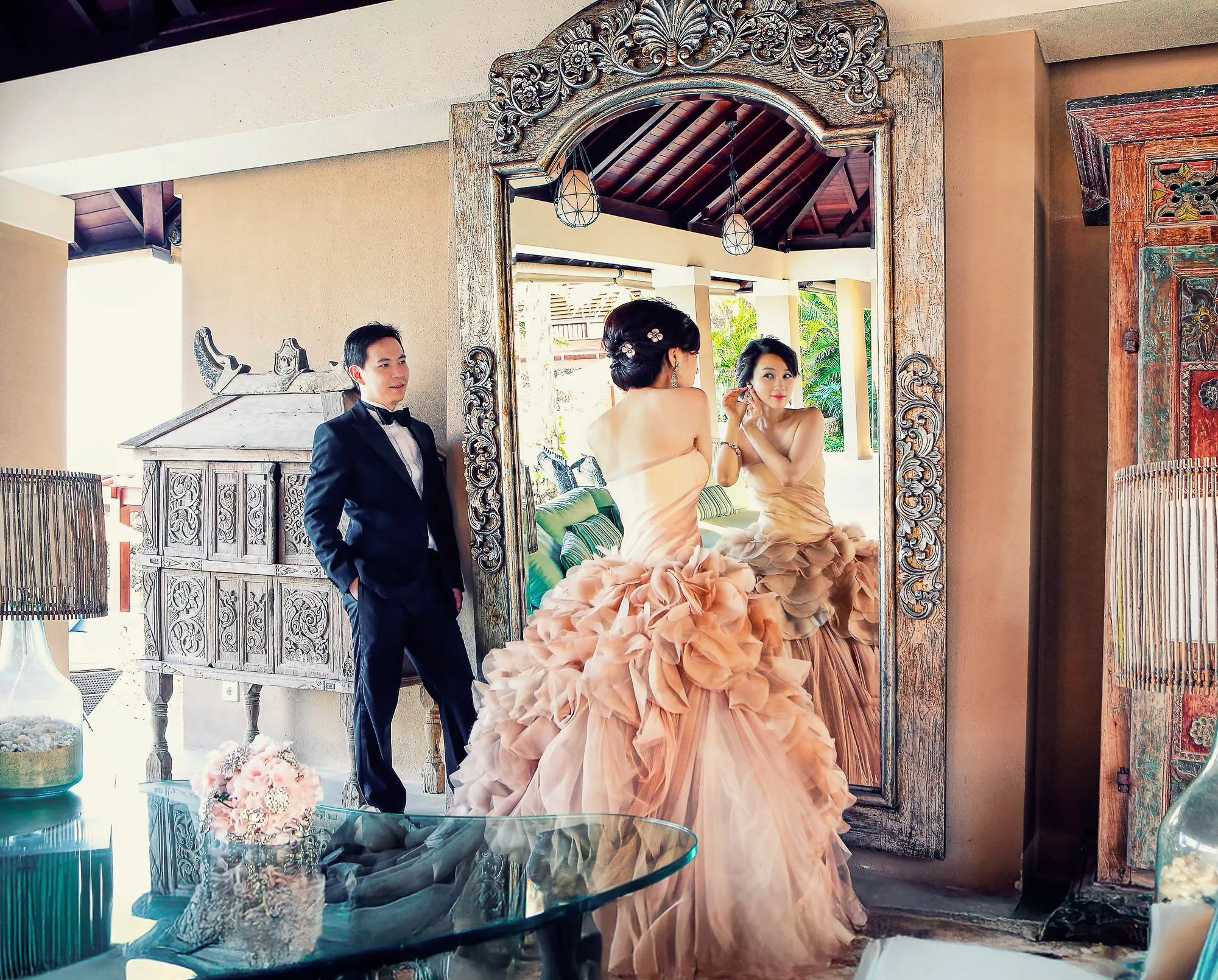 Bride and groom sharing a joyful moment during their wedding ceremony in Singapore by SixSixty Studio