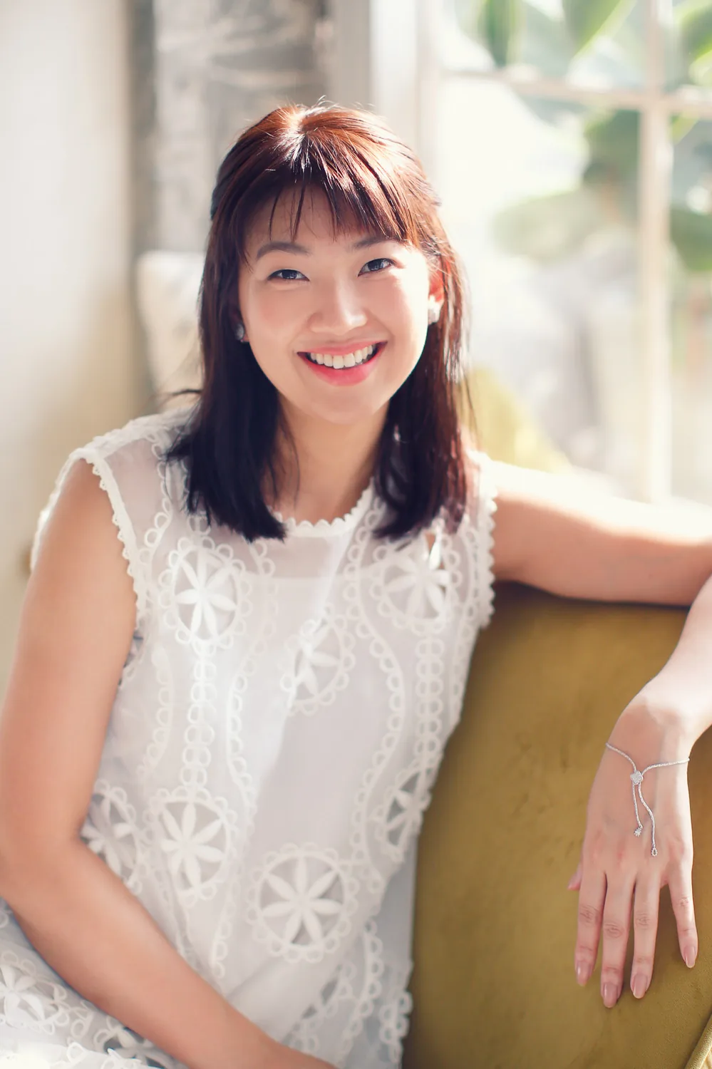 Indoor family portrait of the two sisters during a relaxed home session