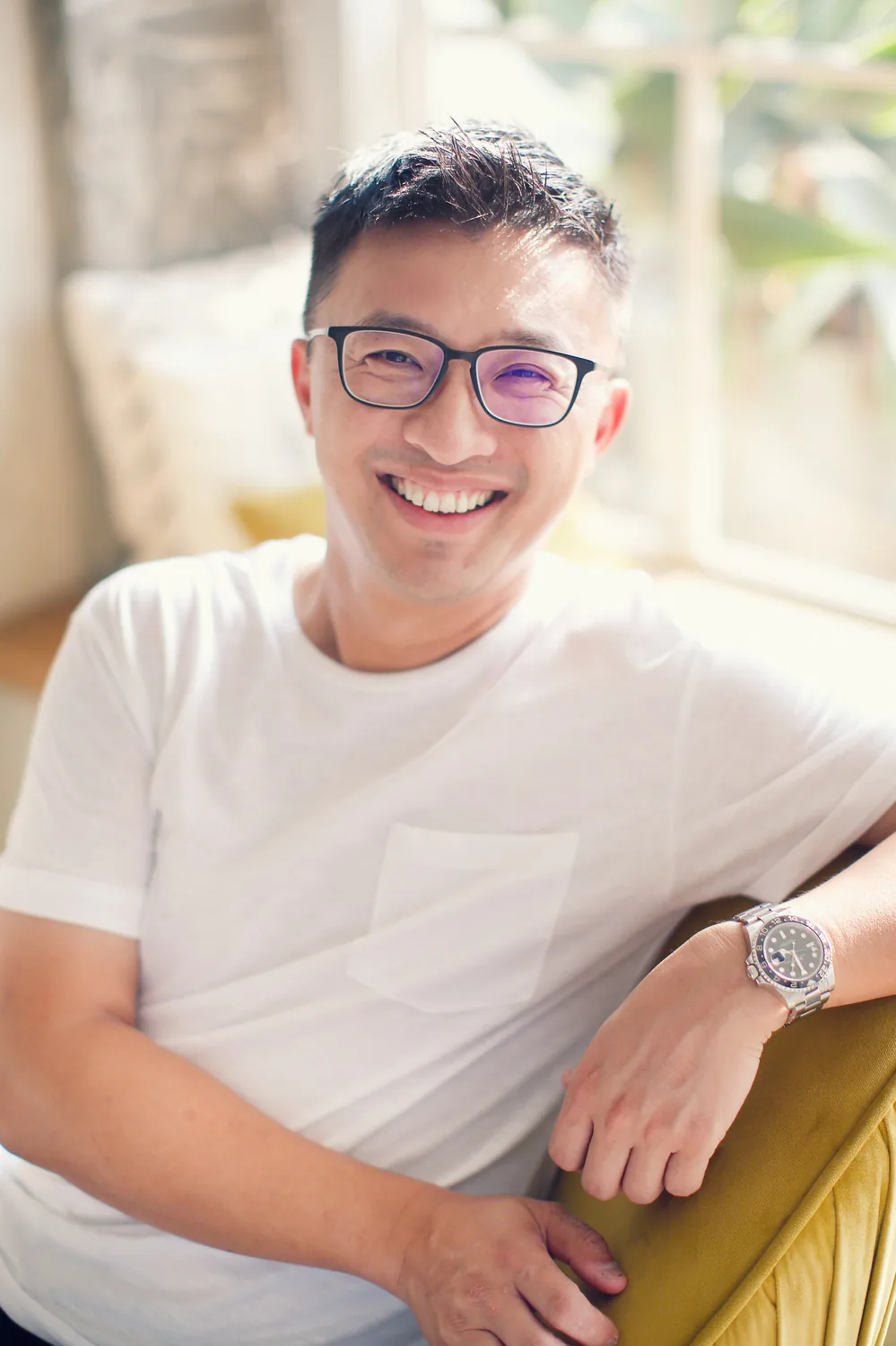 Andrew spending time with his daughters during an indoor family shoot in Singapore