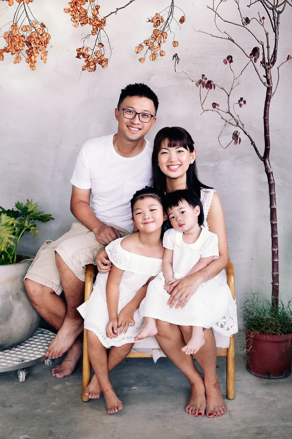 Candid sister moment from a home family session in Singapore