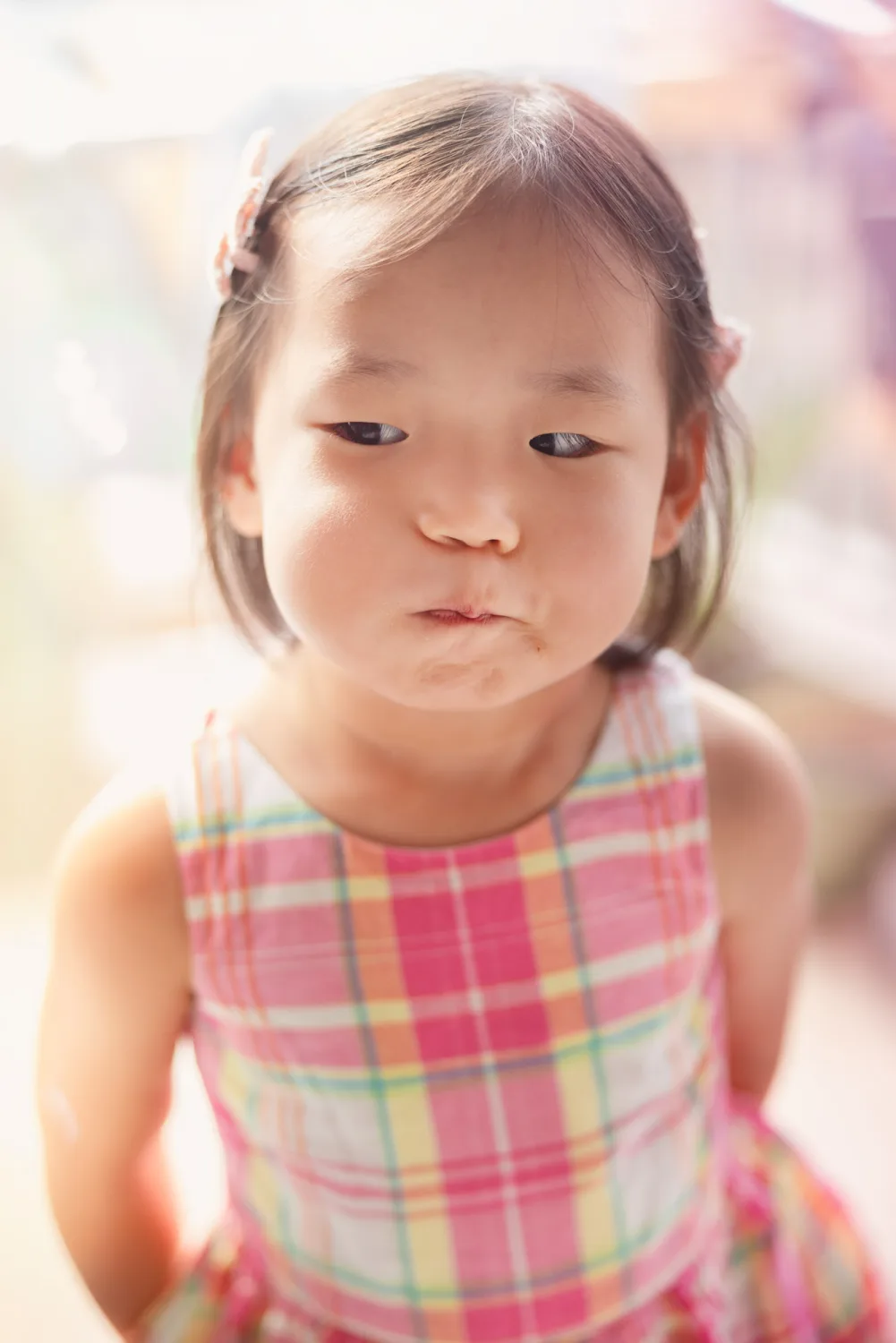 Amelia making a funny face during the indoor start of the family session