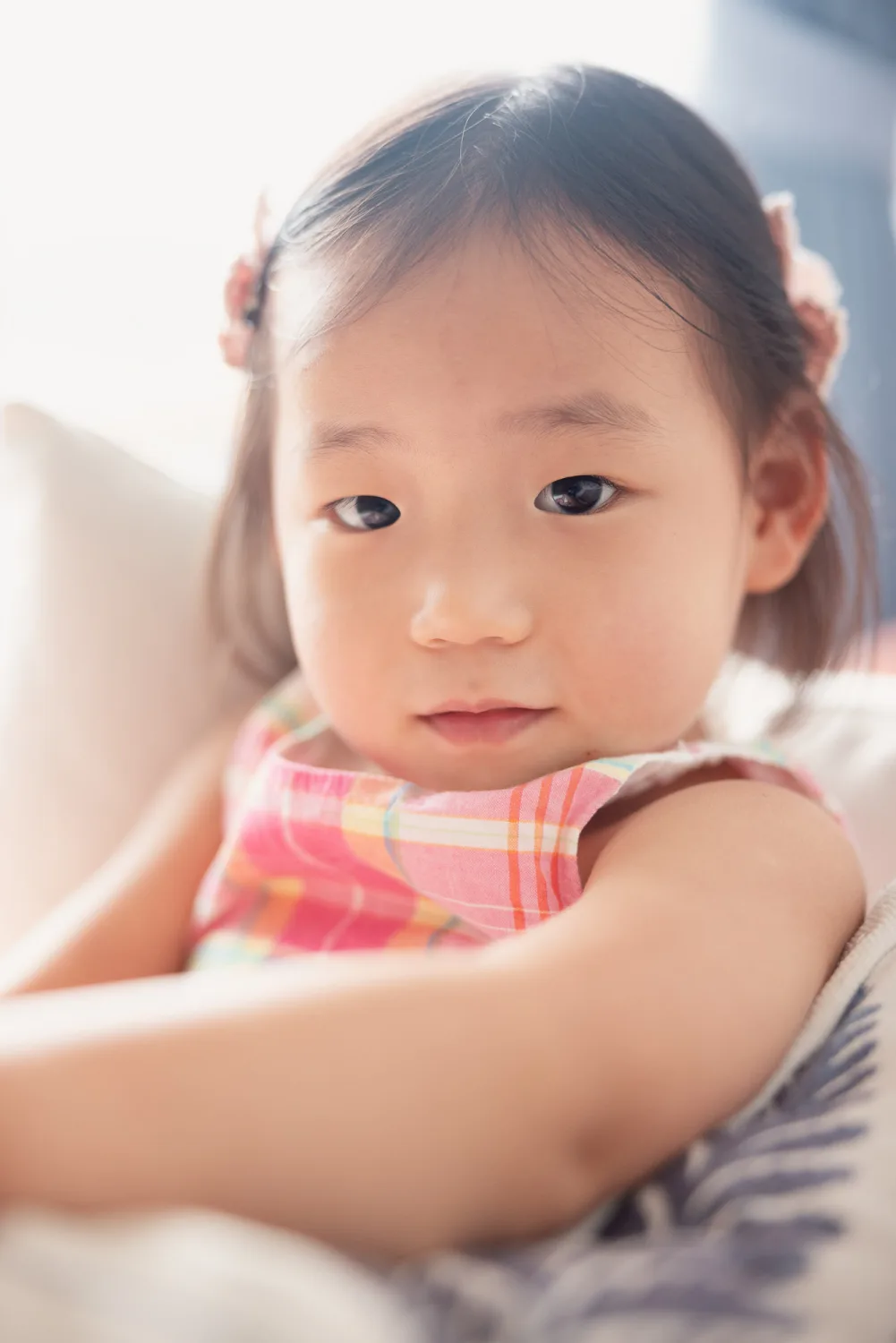 Amelia looking straight at the camera during the indoor family session