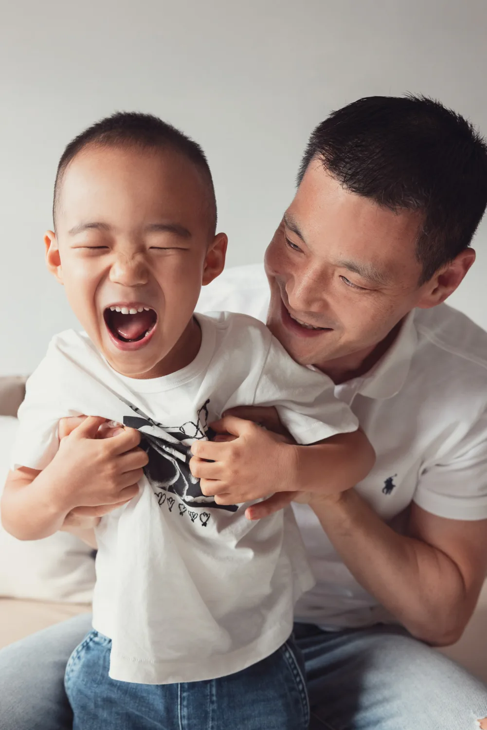 Andrew hugging Nathan during the indoor part of the session