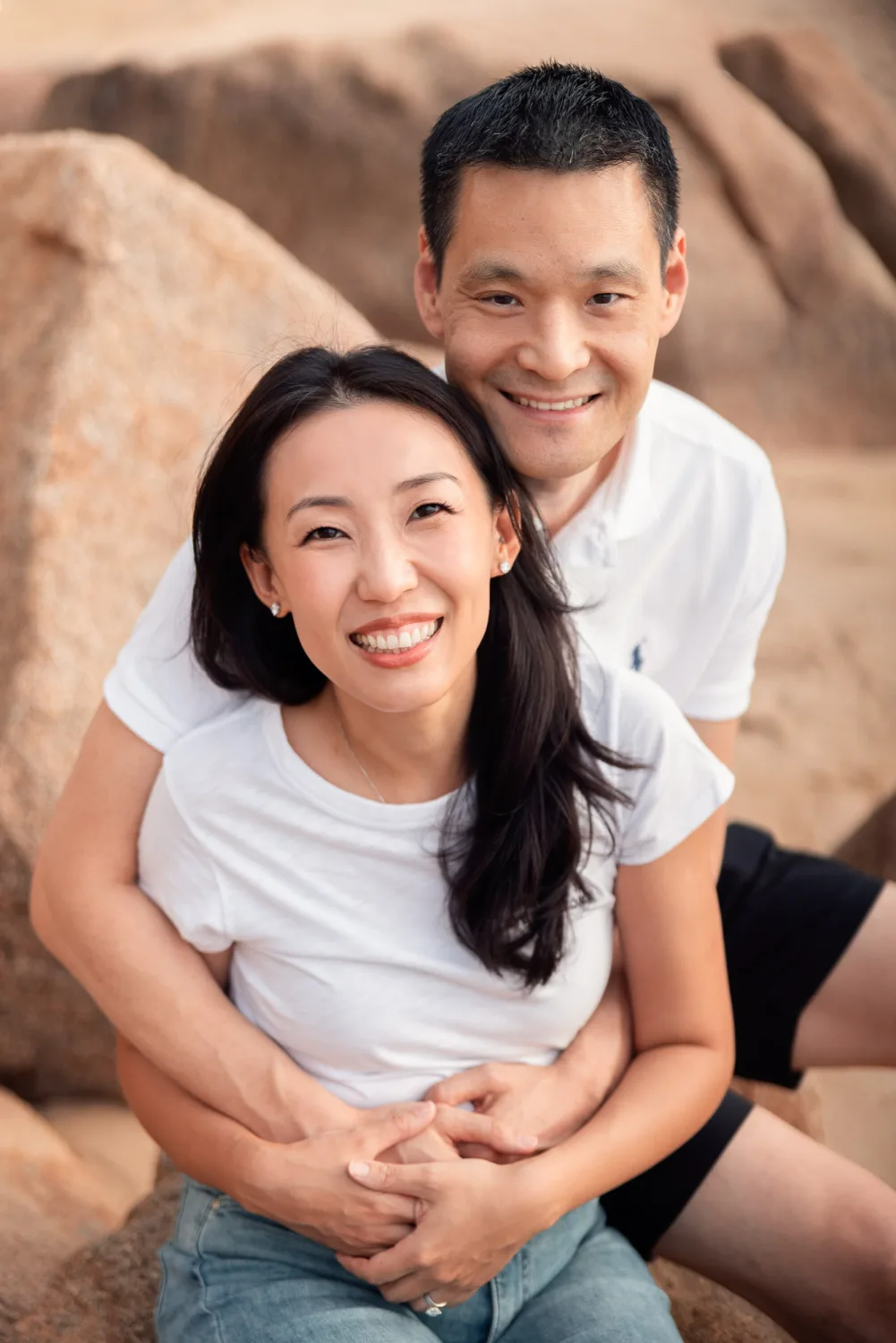 Chelsea and Andrew sharing a quick moment together before the beach chaos resumed