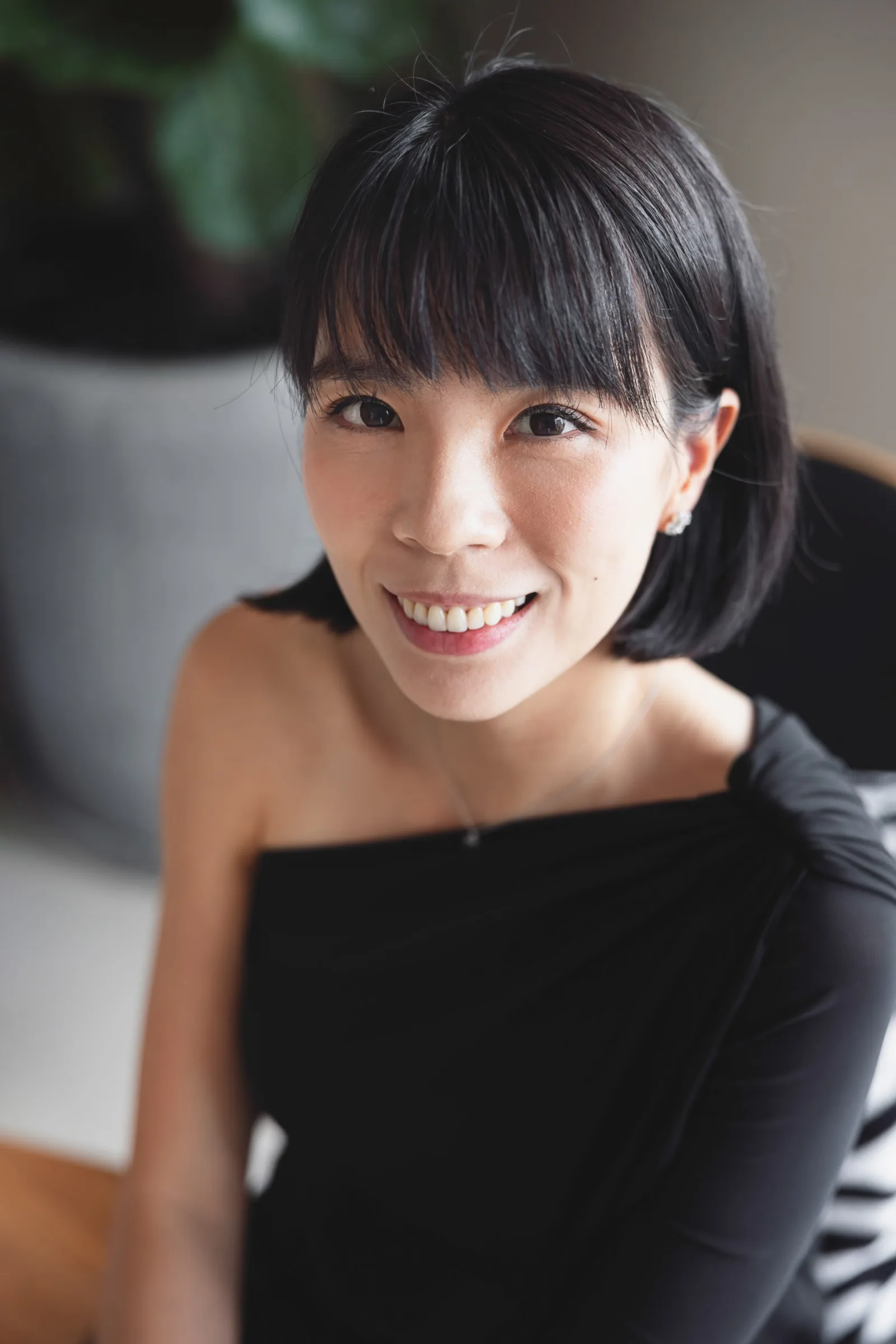 Full family portrait in elegant clothing with beautiful window light