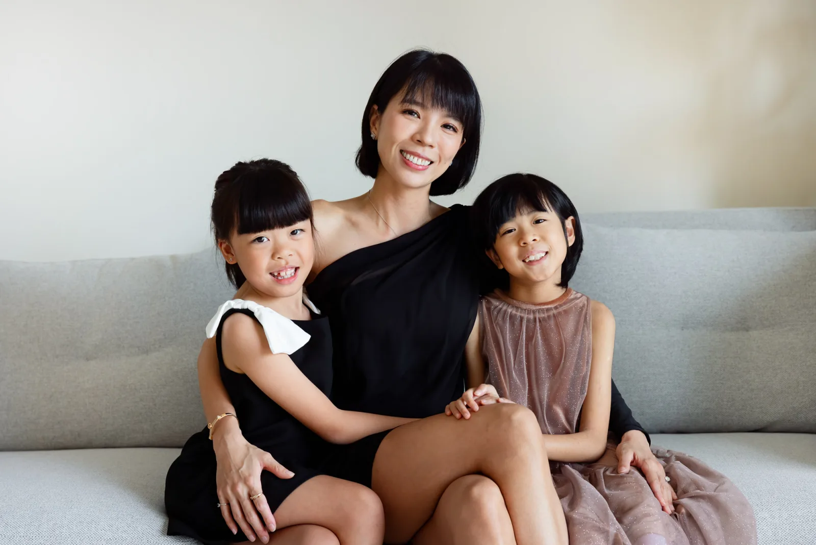 Parents and daughters dressed up for formal indoor family shoot