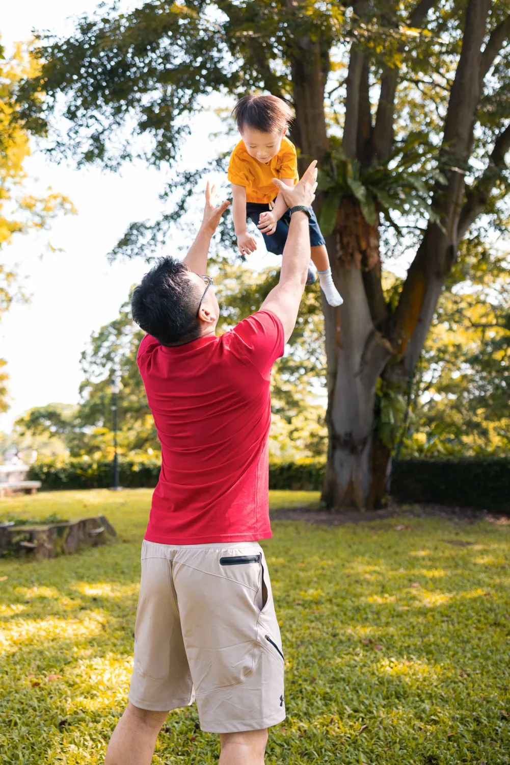 The brothers together in the middle of the park during the Fort Canning family photoshoot
