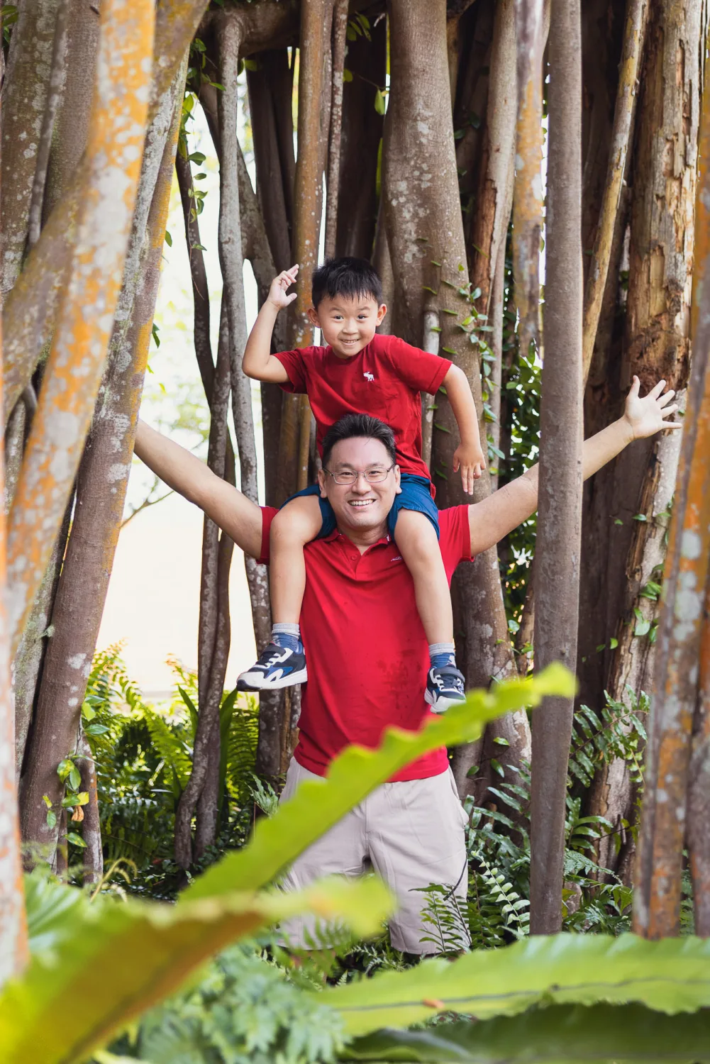 Kevin lifting Wesley high during the Fort Canning family session