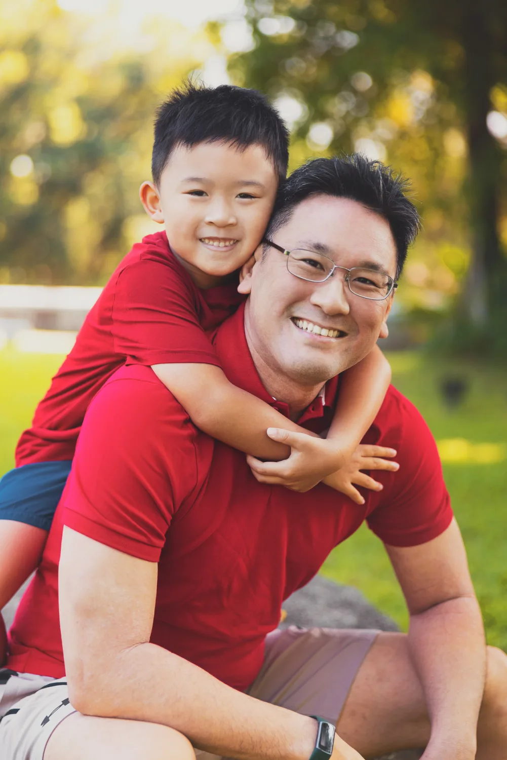 Kevin giving Tristan a piggyback ride during the Fort Canning session