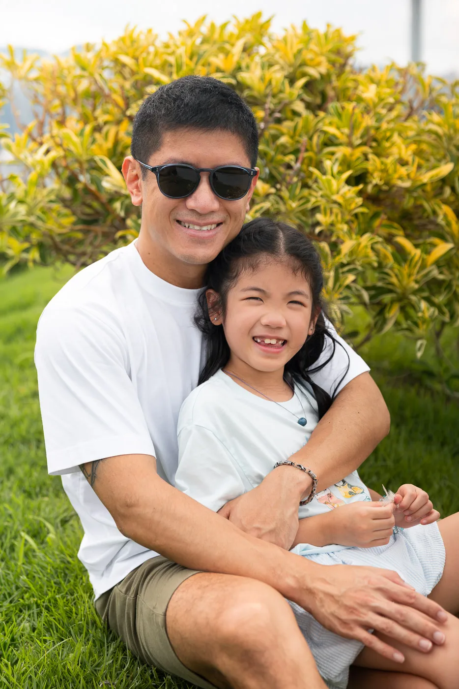 Leila smiling during a Hong Kong waterfront family session