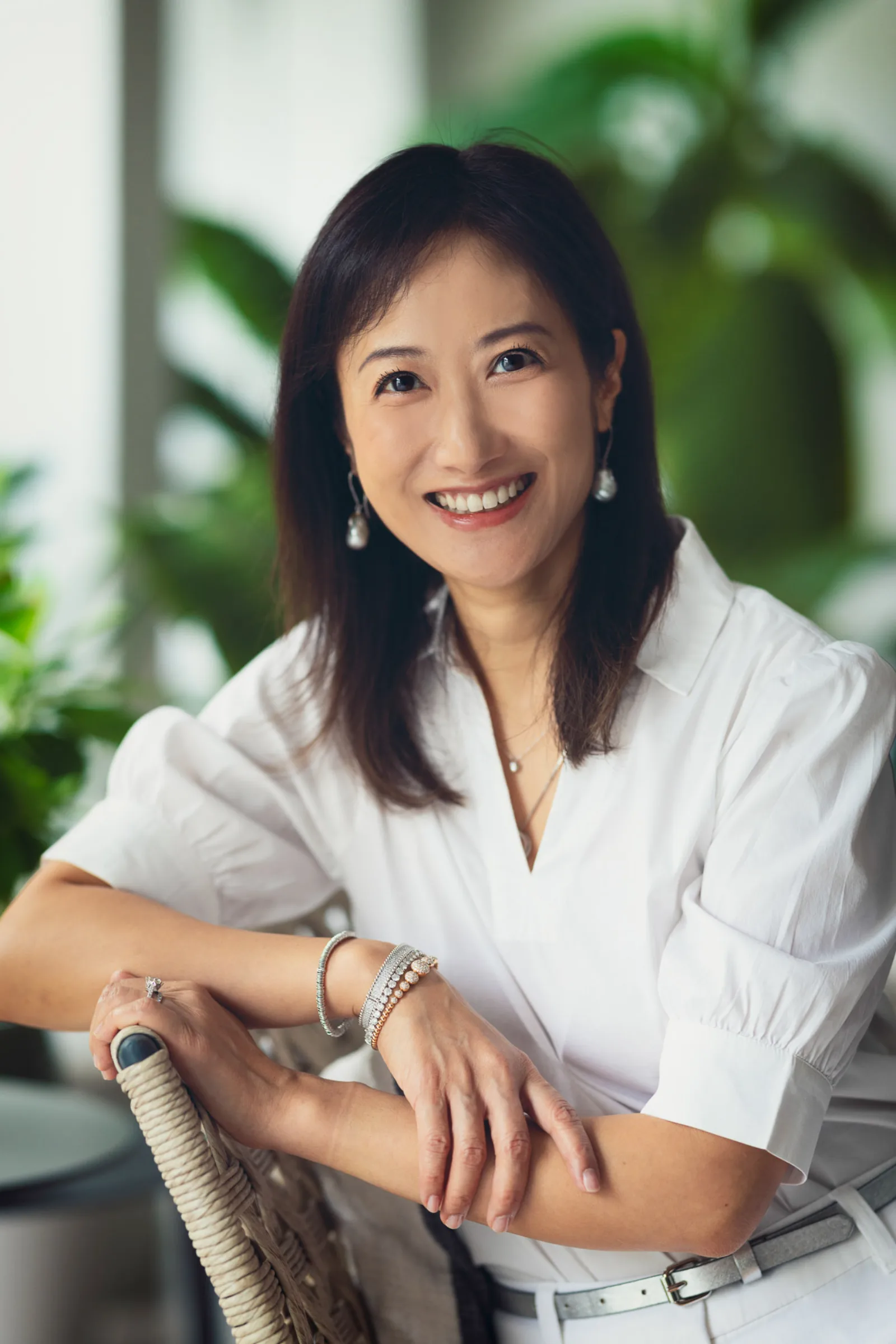 Family of five in colourful casual clothing during indoor photography session