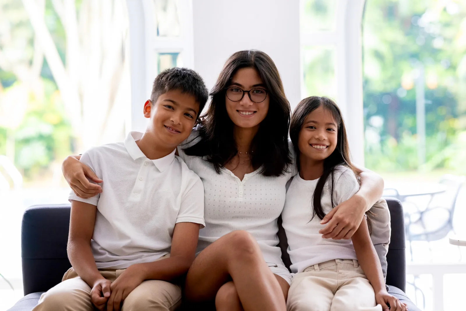 Indoor family portrait with beautiful window light in Singapore home