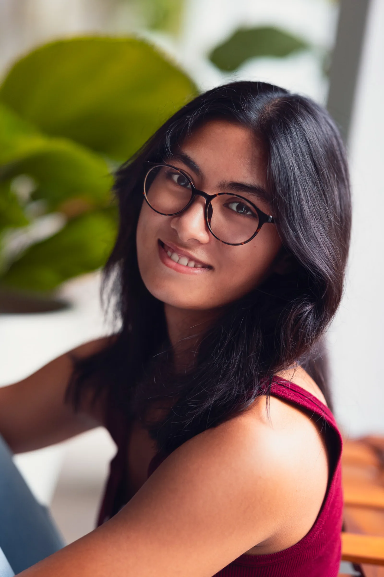 Full family portrait by the window wrapping up their indoor session in Singapore