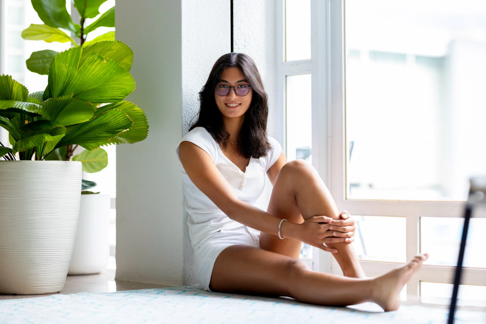 Candid moment of children playing together on the living room floor