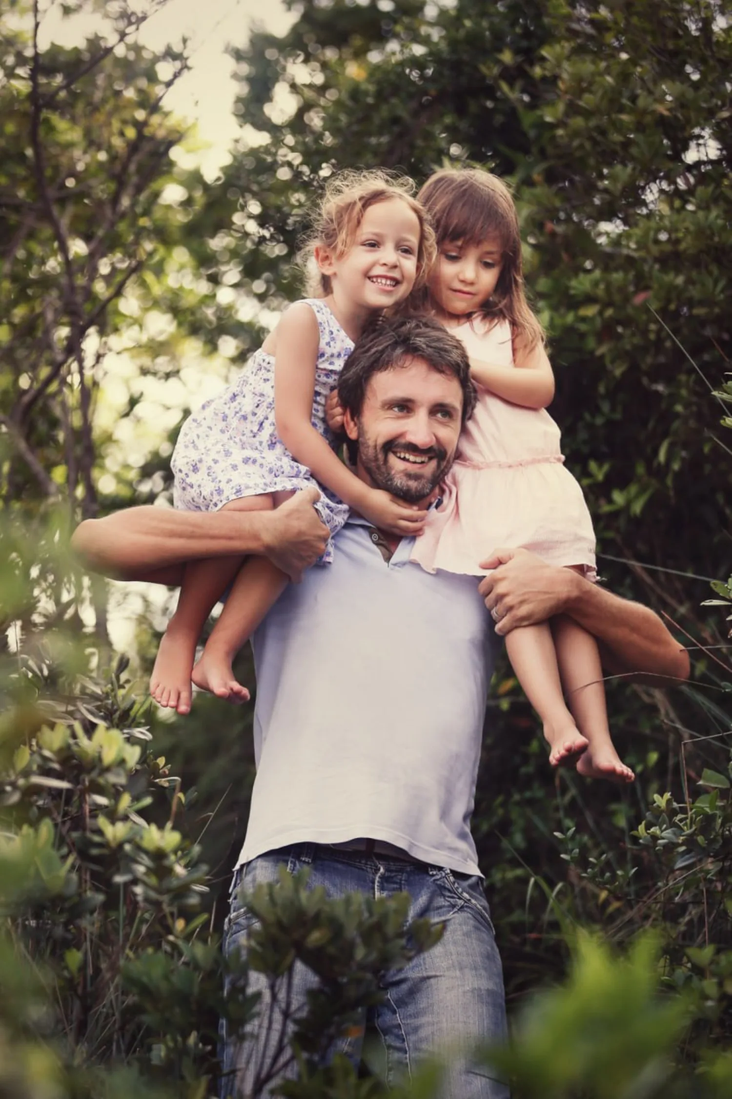 Alex leading the way carrying the two youngest during the hidden family trail session in Hong Kong