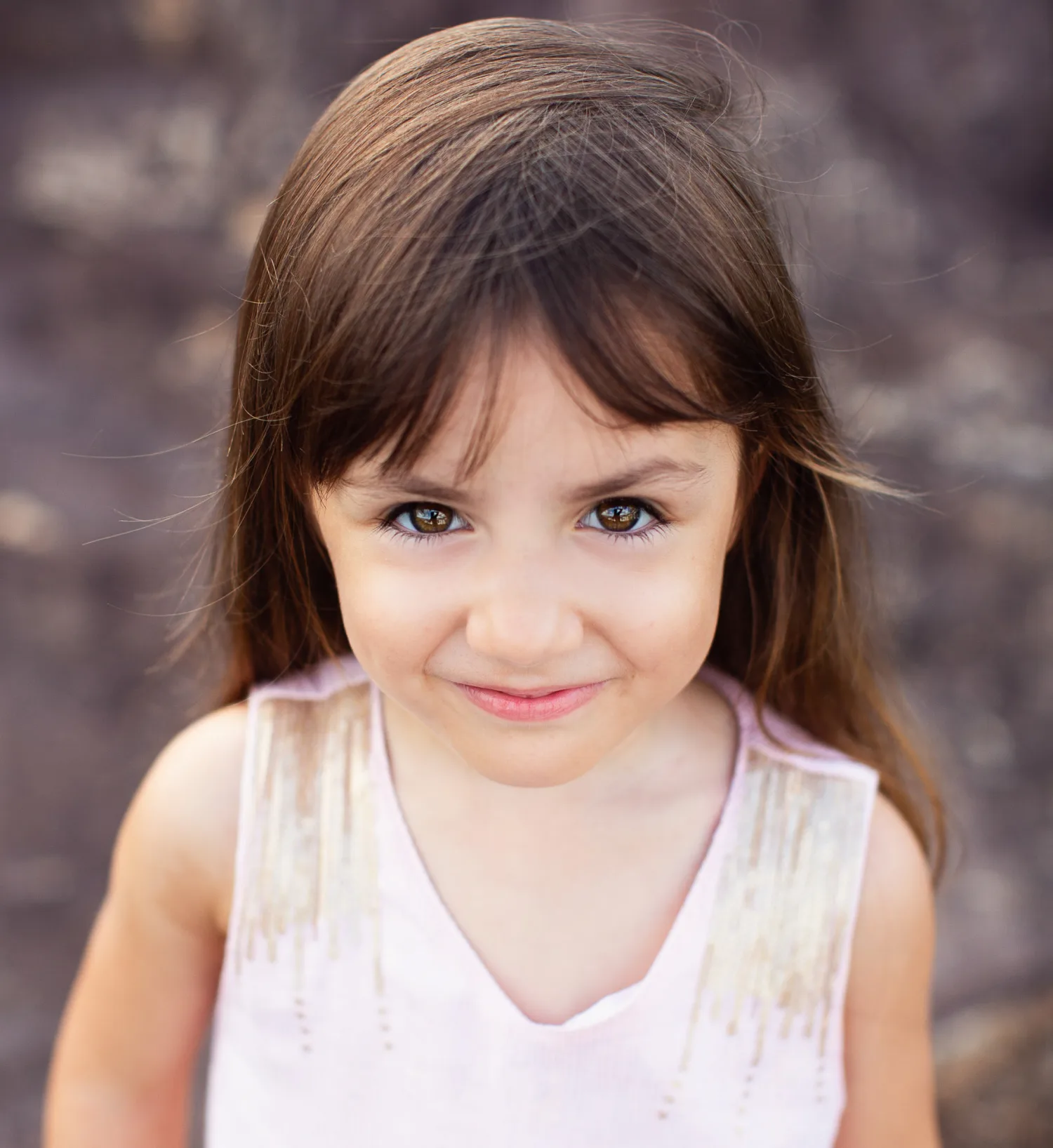 The three sisters together on the rock clearing during the Hong Kong family photo session