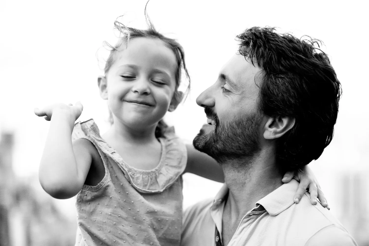 Portrait of one of the daughters on the rock slab clearing with soft Hong Kong light