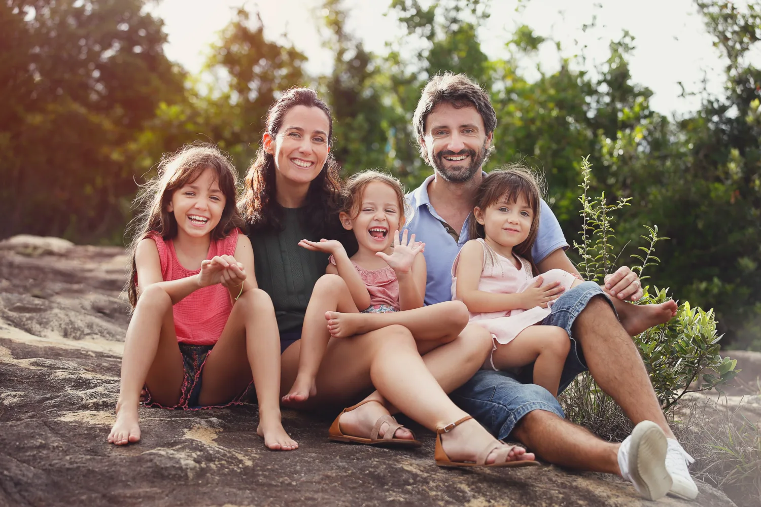 The family at the end of the session on the rock slab overlooking Hong Kong