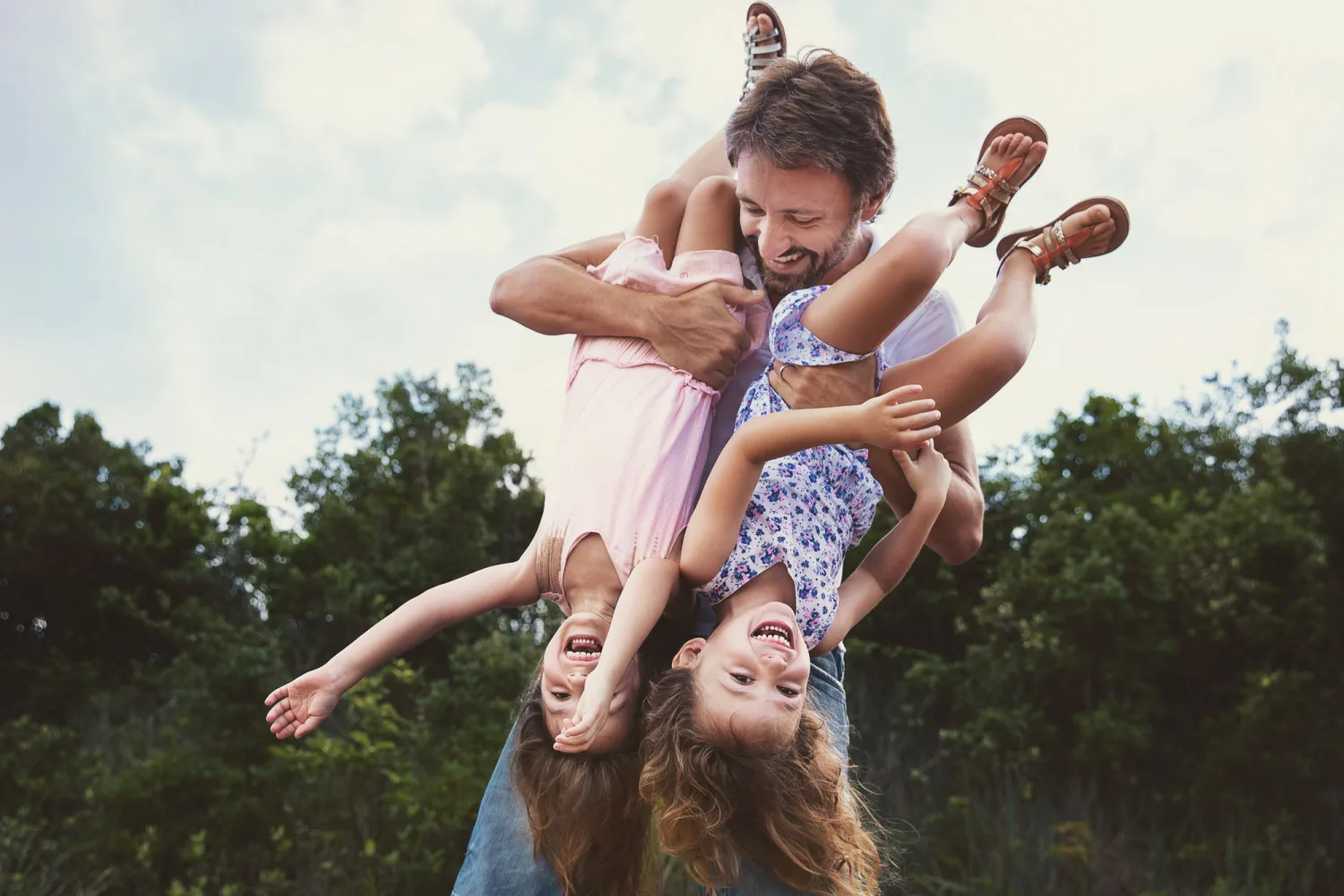 Family portrait on the rock slab viewpoint overlooking Hong Kong