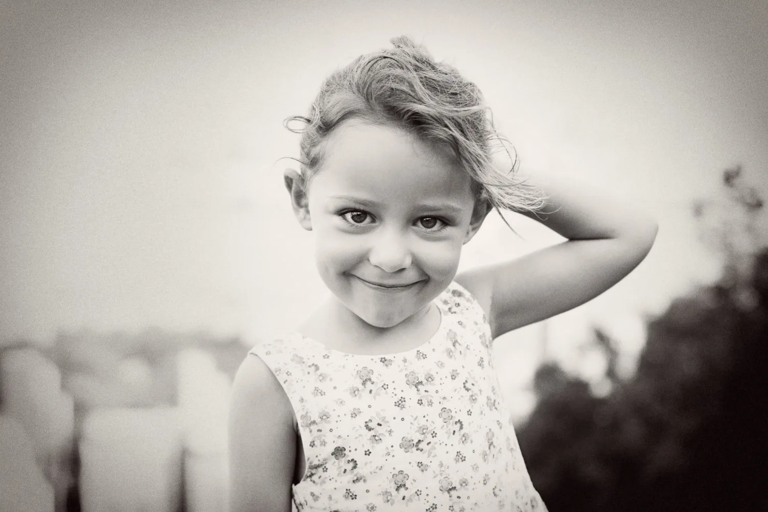 Portrait of one of the daughters during the hidden-view family session in Hong Kong