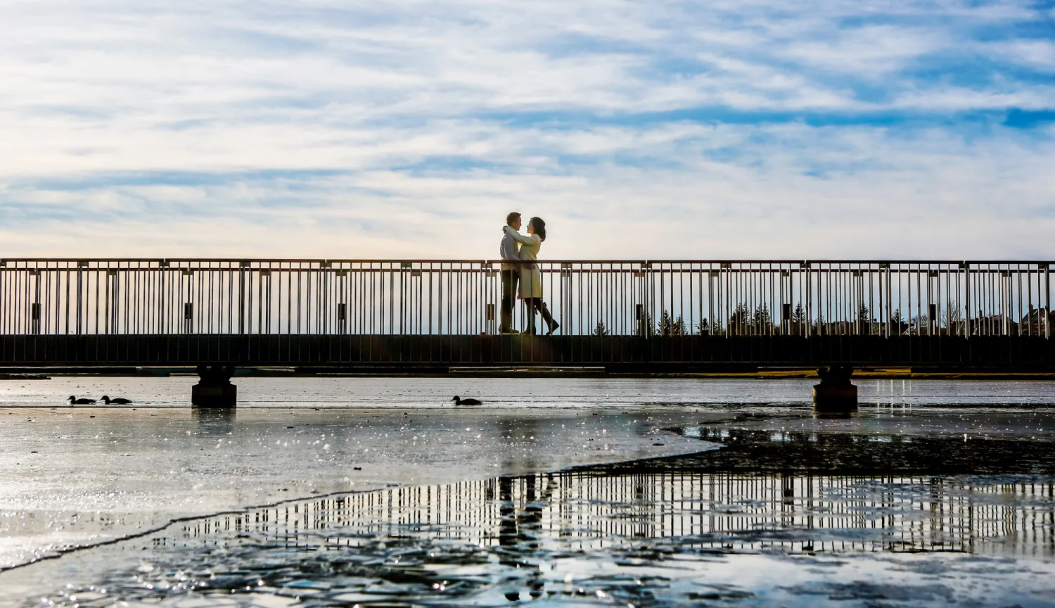 Desiree and Derek sitting beneath the Reykjavik sign in Iceland