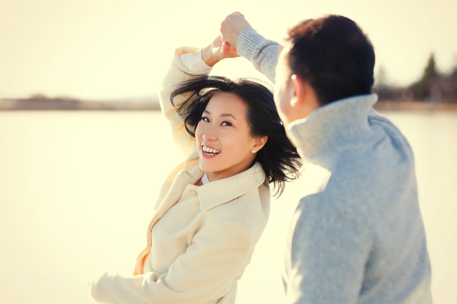 Desiree smiling on the ice during their Reykjavik engagement session