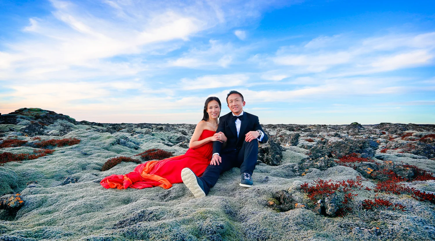Desiree and Derek posed in formalwear against Iceland's rugged lava landscape