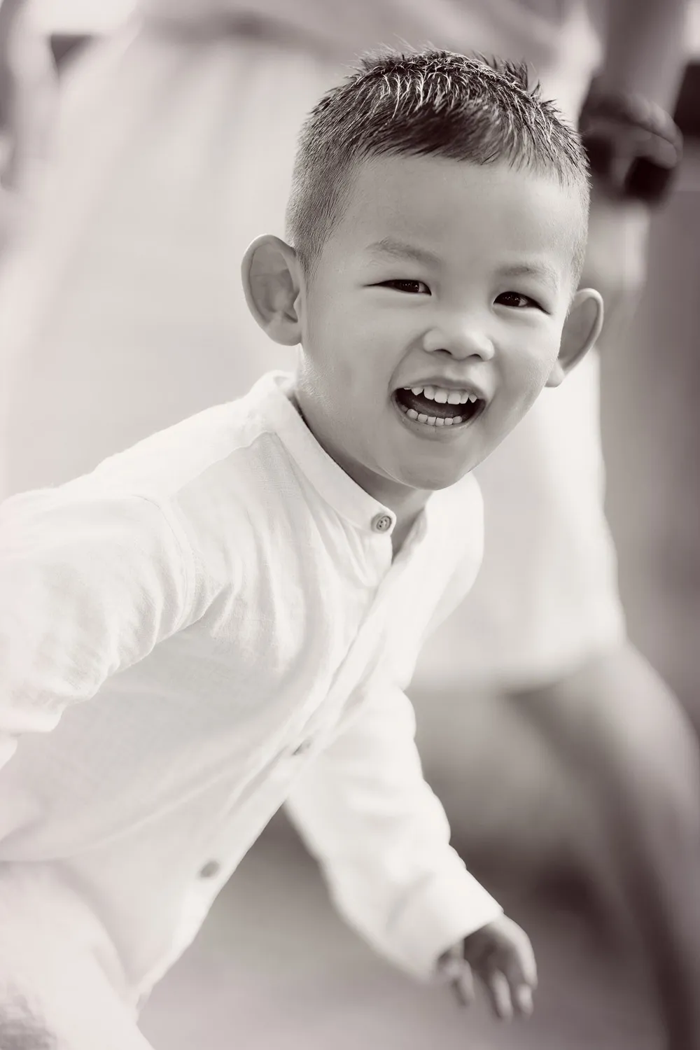 Playful family moment by the water at Marina Bay
